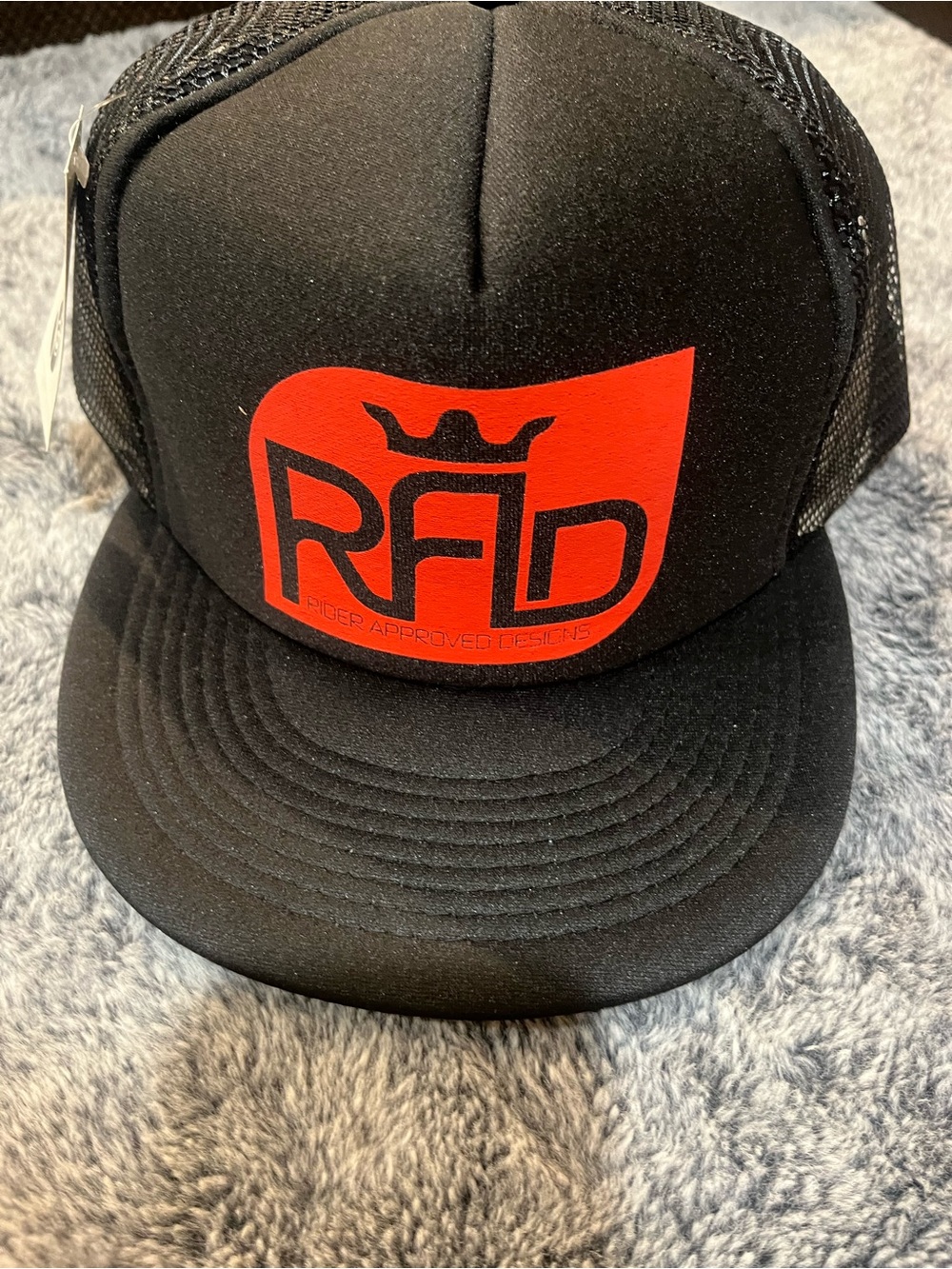Black Trucker Hat with Red Logo